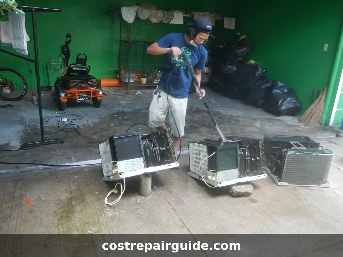 Technician cleaning condenser coils